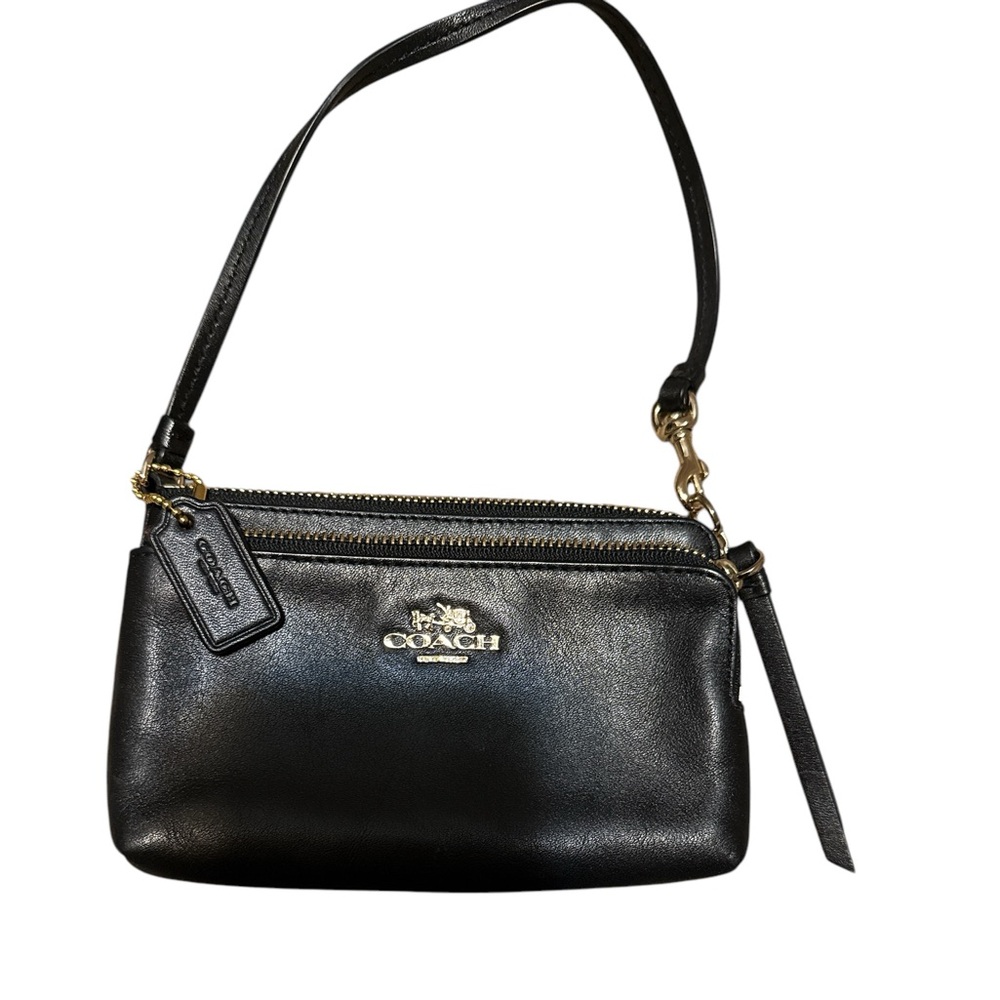 The item is a Coach Double Zip Wristlet in black leather with gold hardwar